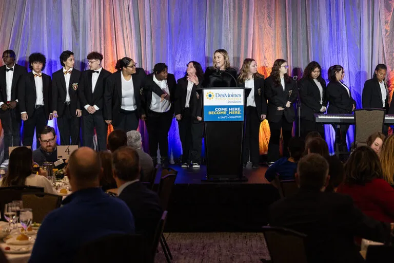 Image of students on stage ready to perform.